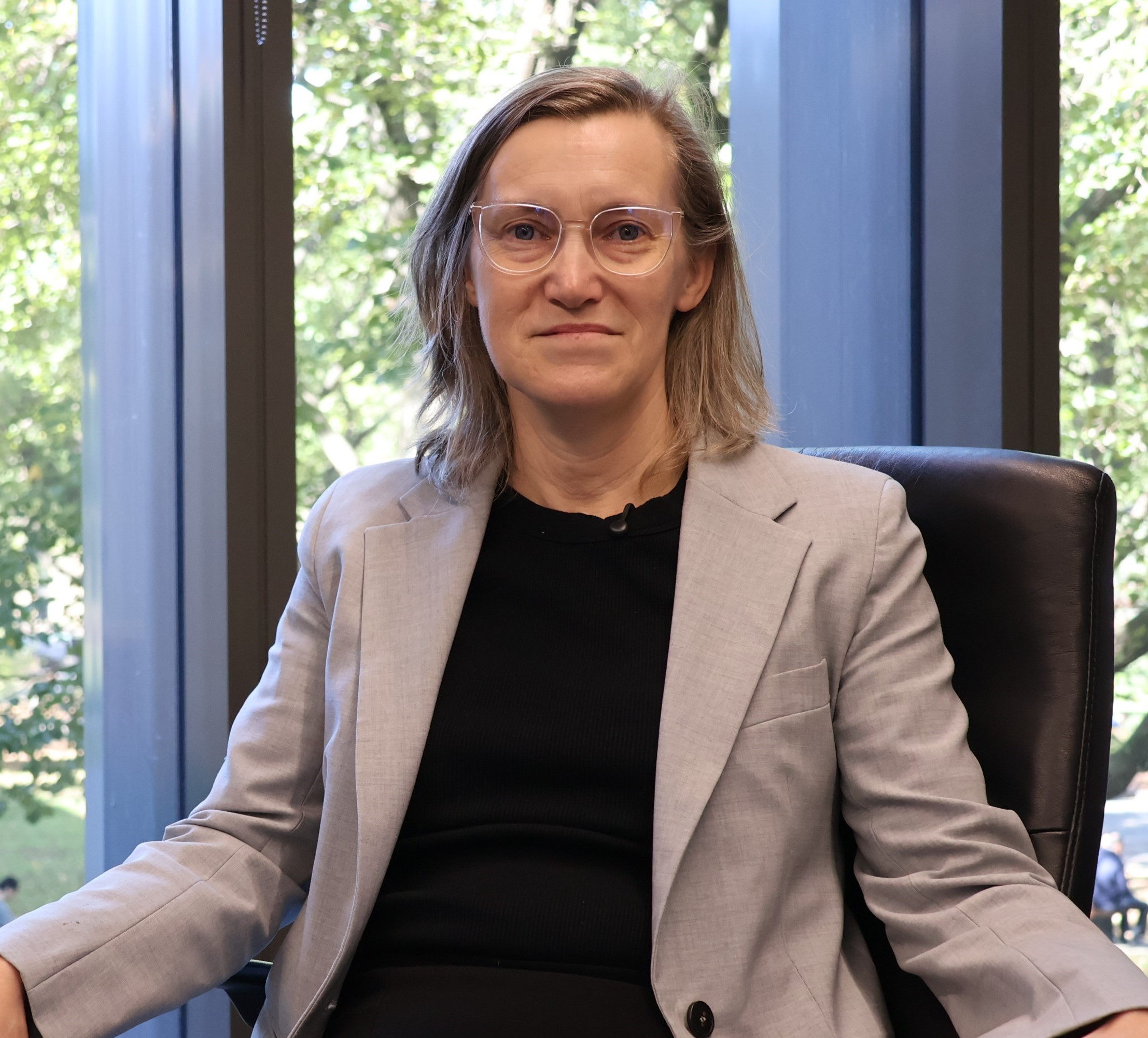 Professor Alison Lane sitting in an office