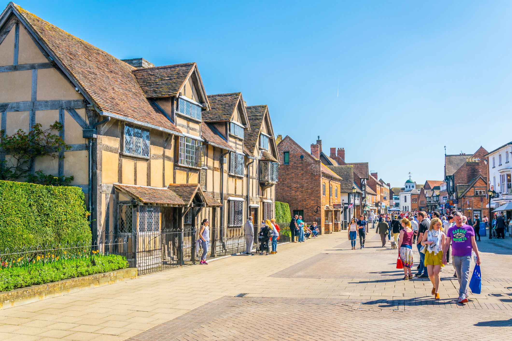 Stratford, UK, April 8, 2017: People are strolling next to the birth house of William Shakespeare in Stratford upon Avon, England